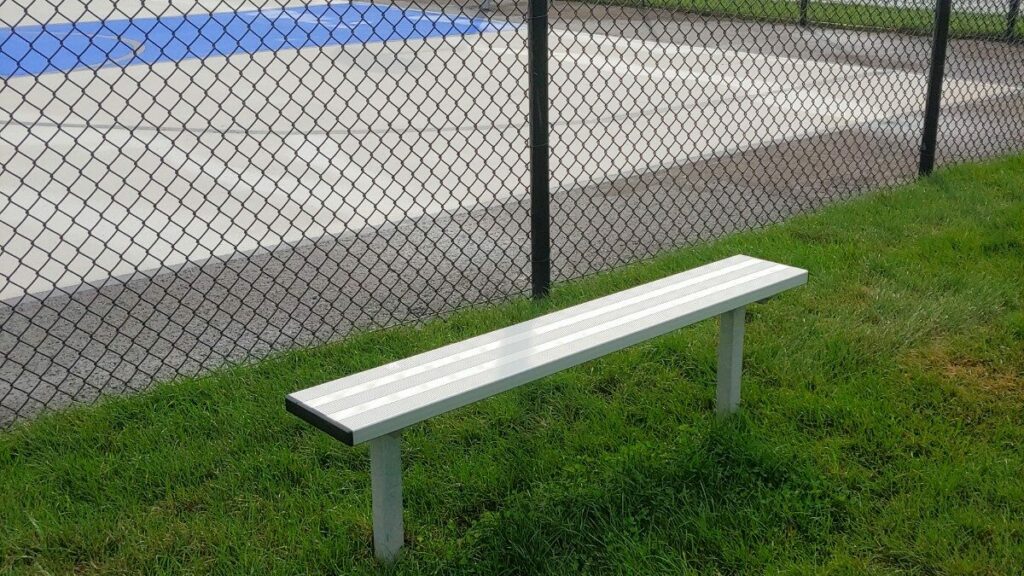 Bench at outdoor basketball court