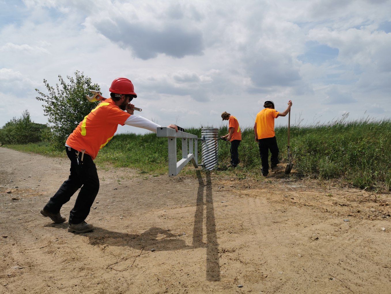 PARCS Techs install trail access gate